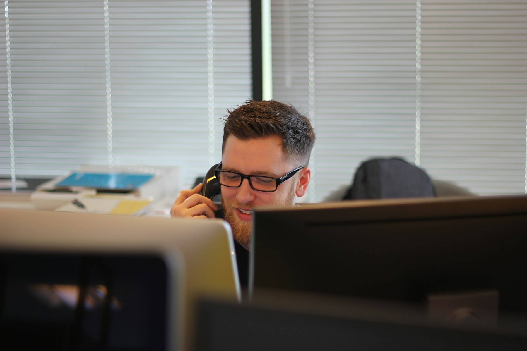 Customer service professional assisting with an enquiry